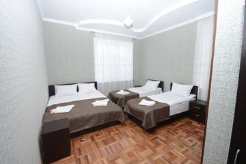 Фото номера Cемейный номер с собственной ванной комнатой Гостевой дом Olimpo Guest House г. Ахалцихе 3