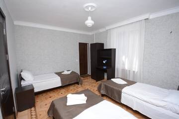 Фото номера Трехместный номер с собственной ванной комнатой Гостевой дом Olimpo Guest House г. Ахалцихе 4