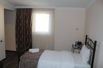 Фото номера Двухместный номер с 2 отдельными кроватями и видом на горы Отель Hotel Suliko г. Ахалцихе 5