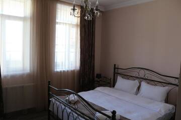 Фото номера Стандартный номер с кроватью размера &quot;queen-size&quot; Отель Hotel Suliko г. Ахалцихе 6