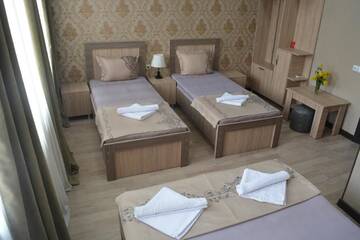 Фото номера Четырехместный номер с собственной ванной комнатой Гостевой дом Guesthouse Millennium Rabathi г. Ахалцихе 11