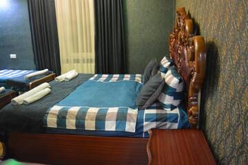 Фото номера Роскошный четырехместный номер Гостевой дом Guesthouse Millennium Rabathi г. Ахалцихе 15