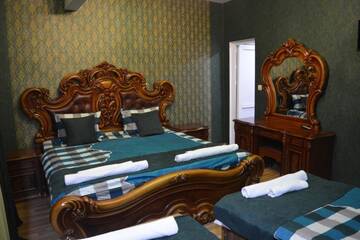 Фото номера Роскошный четырехместный номер Гостевой дом Guesthouse Millennium Rabathi г. Ахалцихе 16