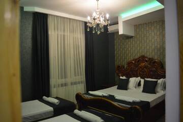 Фото номера Роскошный четырехместный номер Гостевой дом Guesthouse Millennium Rabathi г. Ахалцихе 5