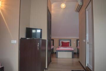 Фото номера Семейный номер с видом на сад Гостевой дом Guesthouse Millennium Rabathi г. Ахалцихе 8